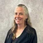 portrait of a woman with gray backdrop